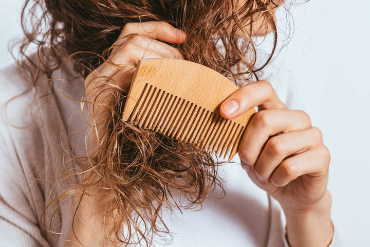 curly hair styling used with realistic hair-care expectations