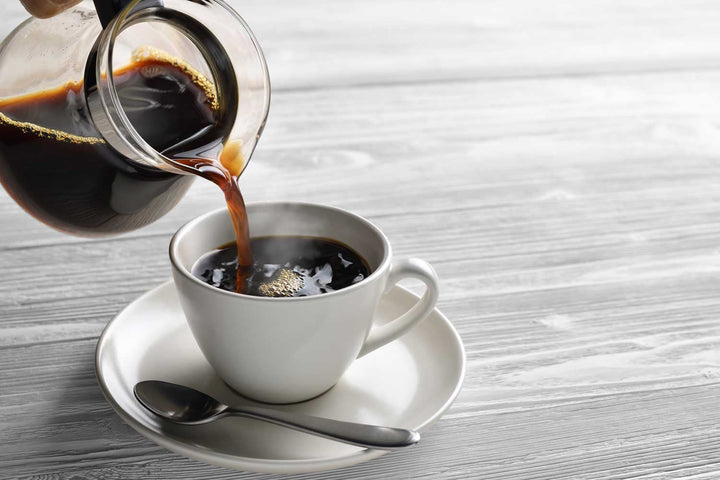 Cup of coffee with guidance on caffeine amount and safety