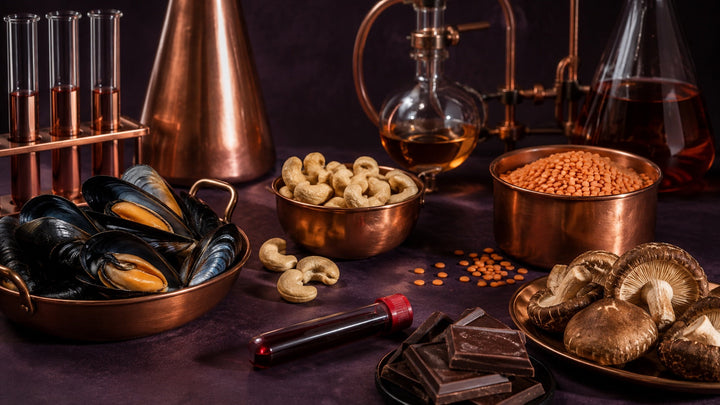 Copper-rich foods with laboratory glassware and an unlabeled blood sample