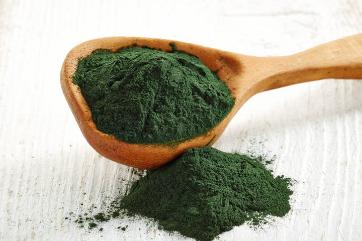 Spirulina powder and supplement label with safety review