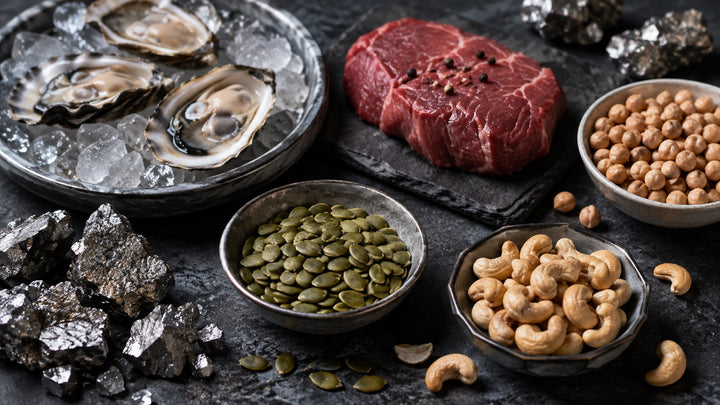 Zinc-rich foods including oysters, beef, pumpkin seeds, chickpeas, and cashews
